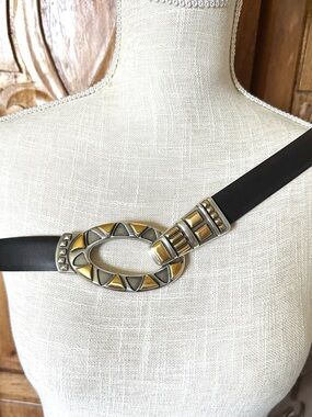 Chico’s vintage black belt with silver and gold tone buckle.